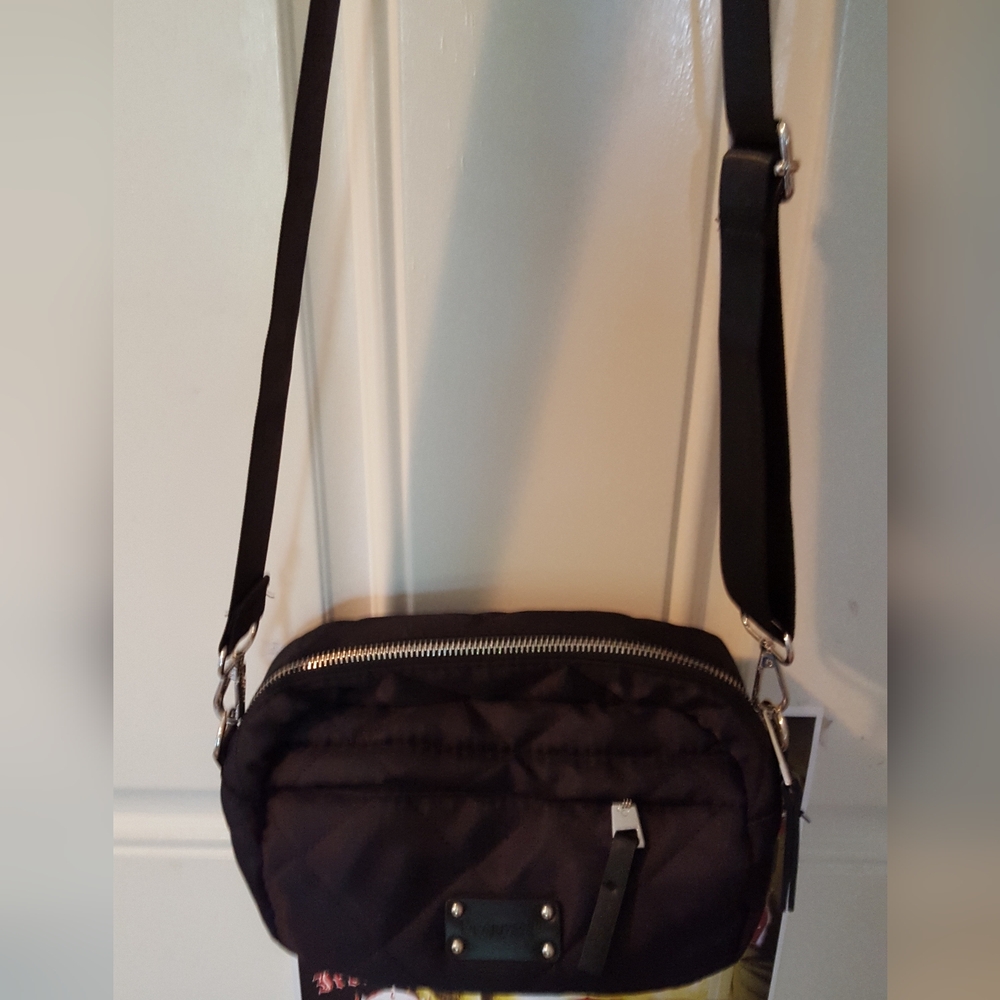 Beautiful Bearpaw slightly used black quilted crossbody purse